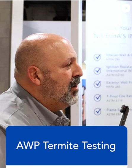 A Nichiha specialist presenting AWP termite testing results at a trade show