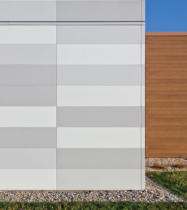 compression joint flashing color matched to illumination panels