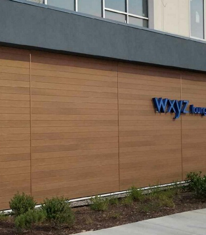 nichiha vintagewood in Cedar with matching H-mold on the outside of a WXYZ lounge