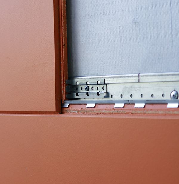 ultimate clip with tab attachment on wall