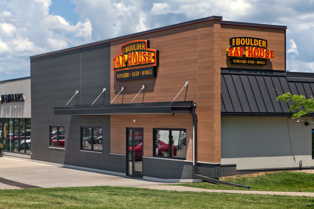 Boulder Tap House restaurant utilizing different textures of Nichiha’s fiber cement cladding.