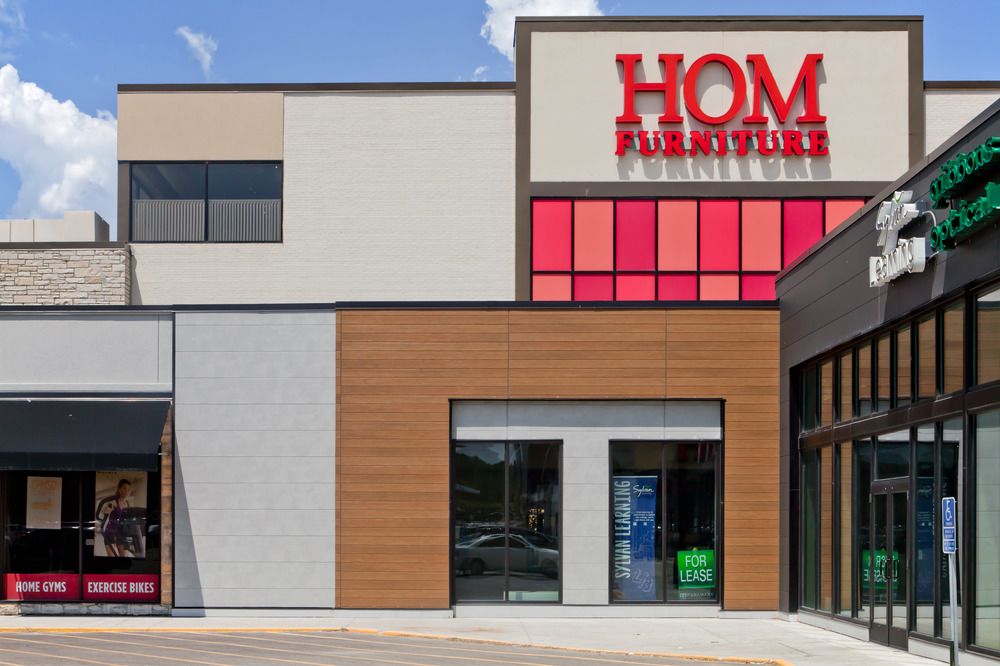 HOM Furniture utilizing different textures of Nichiha’s fiber cement cladding.