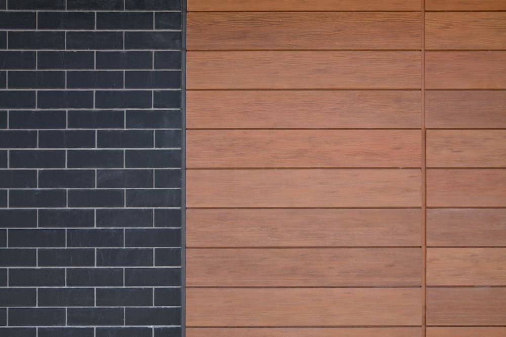 A close-up of Nichiha’s ModernBrick and VintageWood fiber cement cladding.