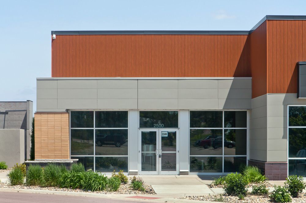 A close-up of South Lorraine Place strip mall utilizing Nichiha’s fiber cement cladding.