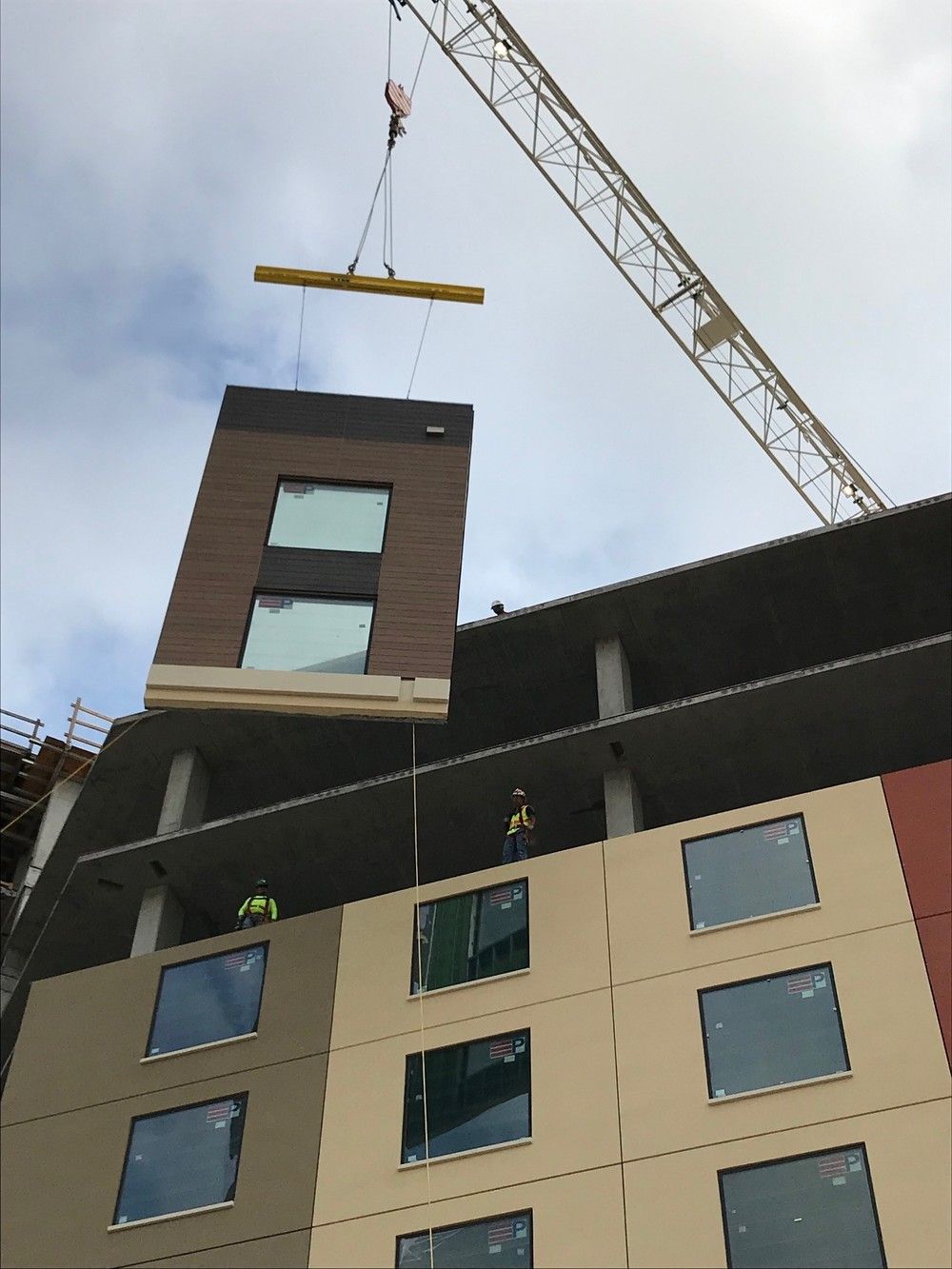 Nichiha completing a modular construction project.