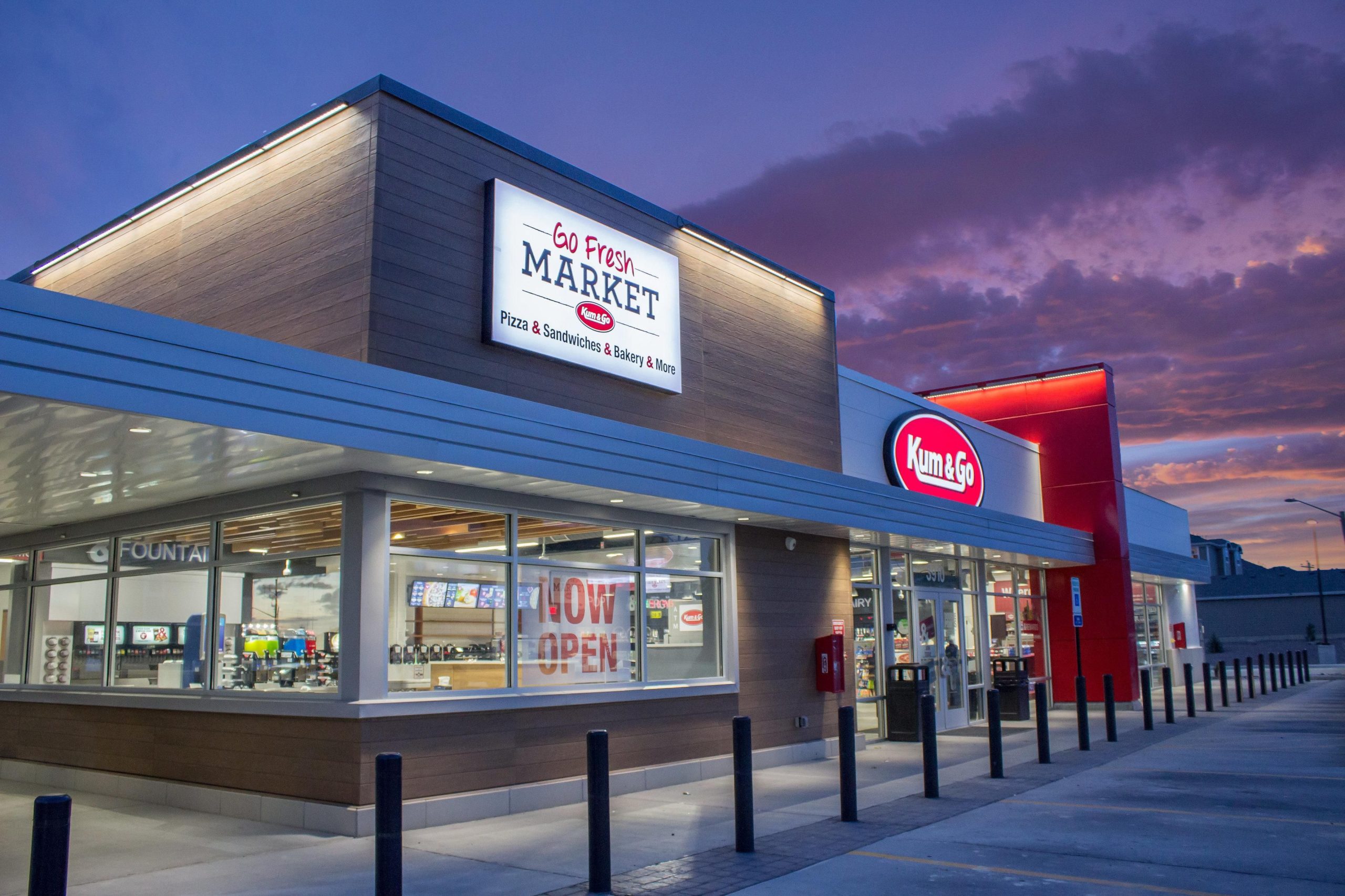 A Kum & Go convenience store at dusk decorated in Nichiha’s fiber cement cladding.