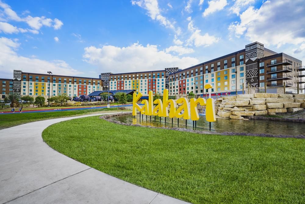 The Kalahari resort sign in yellow in front of their exterior designed by Nichiha’s fiber cement cladding.
