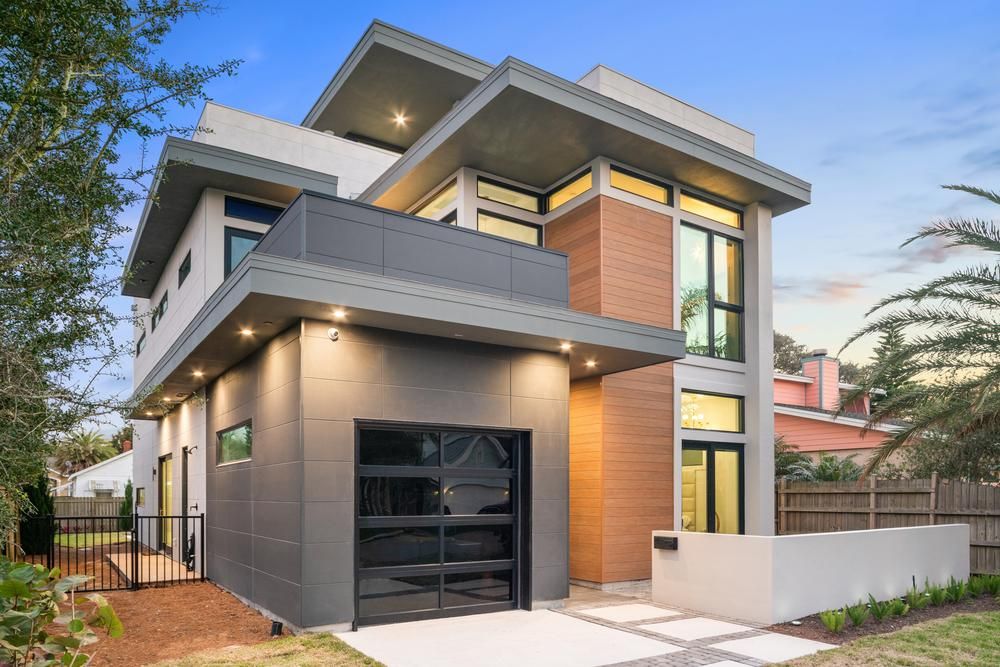 A home with Nichiha&rsquo;s VintageWood as an accent wall on a house with stone-like fiber cement siding.