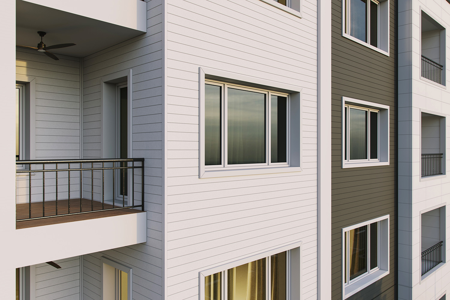  A close-up of a multi-family building using Nichiha&rsquo;s VintageWood Smooth fiber cement cladding in off-white and dark grey. There are multiple rectangle-shaped windows and patios with black bar railings.